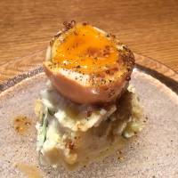 Hayashi\'s potato salad blends two types of potato, coarsely mashed with cucumber, all topped with half a soft-boiled egg and a tangy mustard vinaigrette. | ROBBIE SWINNERTON