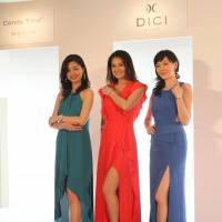 Models pose with luxury watches newly available in Japan. | KYODO
