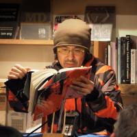 Speaking through other voices:  Hideo Furukawa at a bookstore in Brooklyn, New York, for a live reading of “Belka, Why Don’t You Bark?,” a novel that recounts modern history from the perspectives of dogs trained for wartime combat.  | LISA KATO