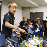 Takashi Usami participates in a news conference on Tuesday in Osaka. | KYODO
