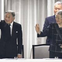 Emperor Akihito and Empress Michiko attend their first Japan national team rugby match at Ajinomoto Stadium on Saturday. | KYODO
