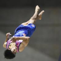 Kenzo Shirai performs during the floor exercise competition at the national apparatus championships on Sunday. | KYODO