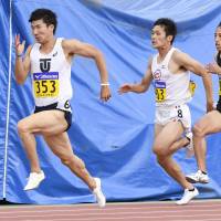 Yoshihide Kiryu runs in the men\'s 100-meter race at the National Collegiate Individual Championships in Hiratsuka, Kanagawa Prefecture, on Saturday. | KYODO