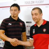 Ayumu Goromaru (left) poses during a news conference on Tuesday in Toulon, France. | KYODO