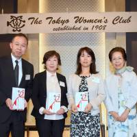 Koji Ogawa (left), representative of USNOVA, Noriko Shiota (second from left), deputy head of the Salvation Army Japan\'s Sekoryo orphanage, and Sayuri Daimon (third from left), managing editor of The Japan Times, receive donations from Mitsuko Konoma, president of the Tokyo Women\'s Club, at the Capitol Hotel Tokyu on June 6. The women\'s club donated &#165;200,000 to The Japan Times Readers\' Fund at the club\'s 108th annual luncheon. | SATOKO KAWASAKI