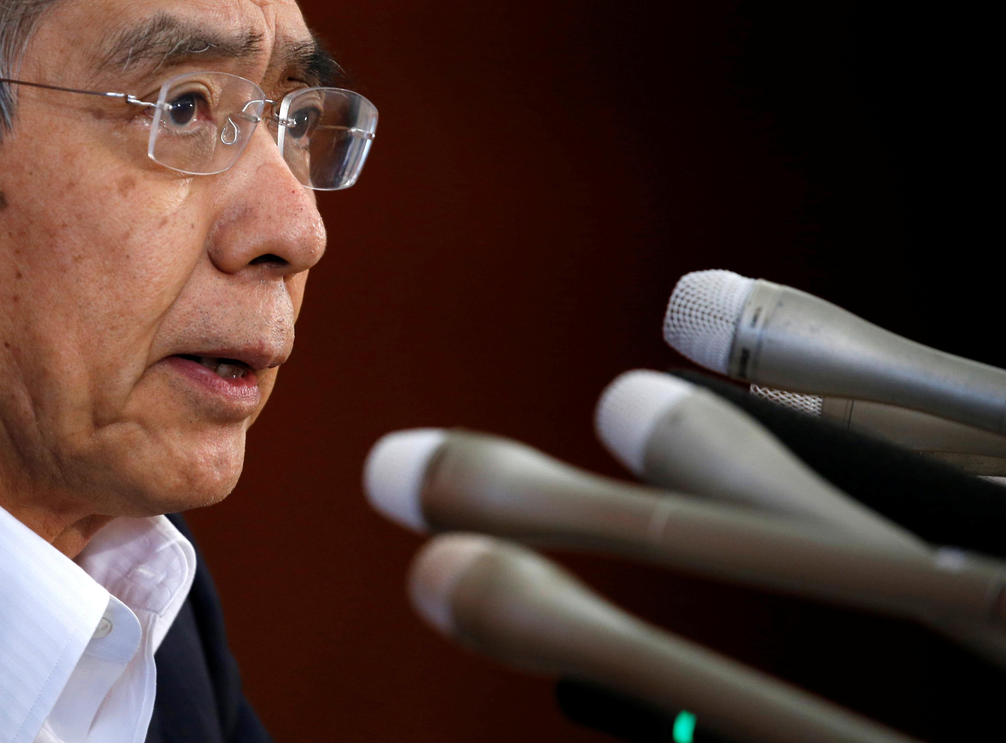 Bank of Japan Gov. Haruhiko Kuroda attends a news conference at the BOJ headquarters in Tokyo on Friday. | REUTERS