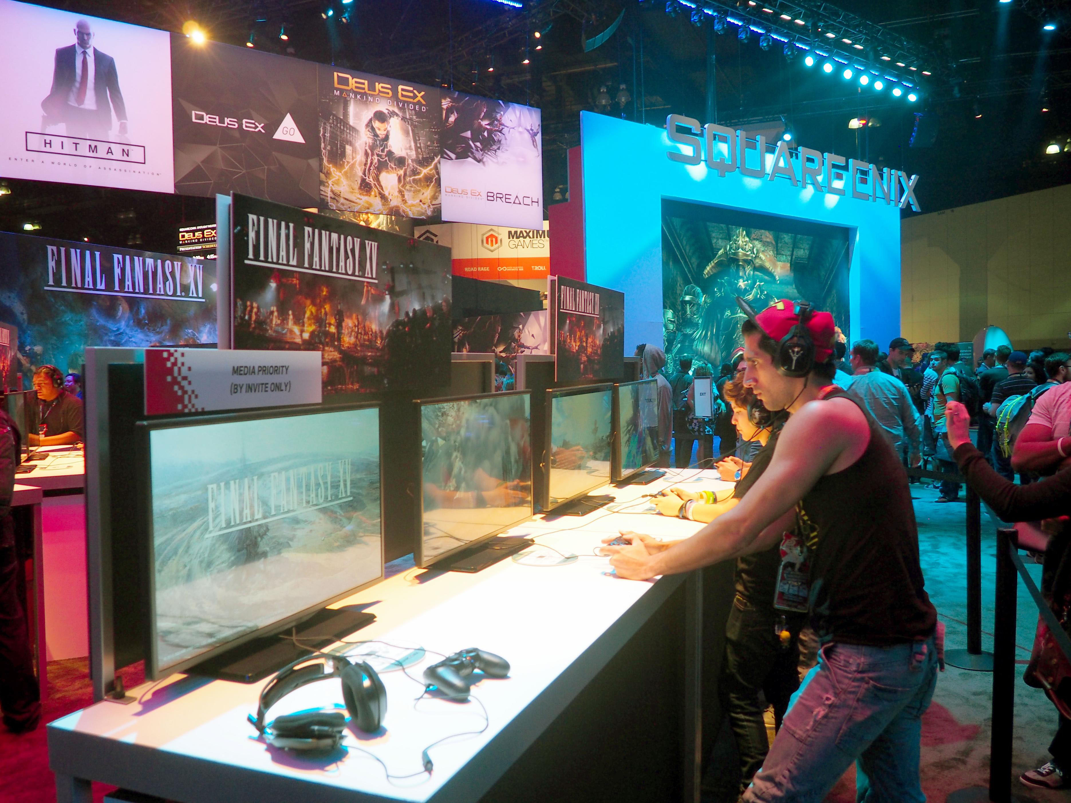 Visitors play 'Final Fantasy XV' on the opening day of the Electronics Entertainment Expo, one of the biggest showcases for new video games, in Los Angeles on June 14. | KYODO