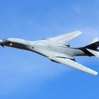 A B-1 bomber performs a flyby during a demonstration at Indian Springs Air Force Auxiliary Field in Nevada in 2004. | U.S. AIR FORCE