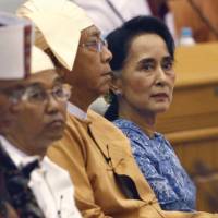 Aung San Suu Kyi and Htin Kyaw (second from right), newly elected president of Myanmar, attend an oath-taking ceremony in parliament in Naypyitaw on March 30. Myanmar's Aung San Suu Kyi: Falling star or beacon of hope?