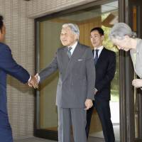 Emperor Akihito and and Empress Michiko greet Palau President Tommy Remengesau at the Imperial Palace in Tokyo Monday. | POOL / KYODO