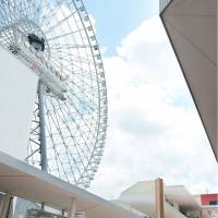 The tallest Ferris wheel in Japan opens for business Friday at Expocity, the new commercial complex in Suita, Osaka. | KYODO