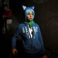 Melissa March, 13, is seen backstage during the Cuban otaku festival held in Havana on Sunday. Despite challenges, young Cubans being drawn into world of anime, manga