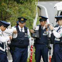Police officers are deployed to block paths for the main venue of the Group of Seven Ise-Shima Summit in May. The National Police Agency said Friday that it cannot rule out the possibility of Japan becoming a target of terrorist attacks. | KYODO