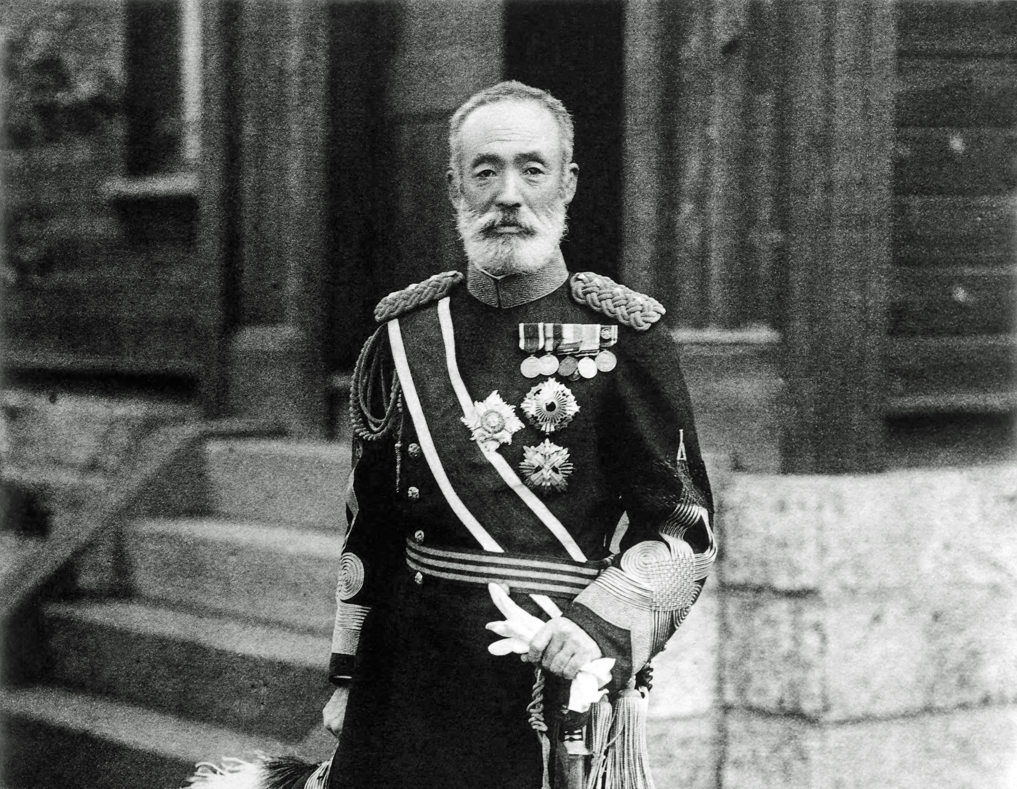 Searching for honor in death: Gen. Maresuke Nogi stands outside his home in Tokyo, the site where he and his wife committed ritual suicide in response to the death of Emperor Meiji. | PUBLIC DOMAIN