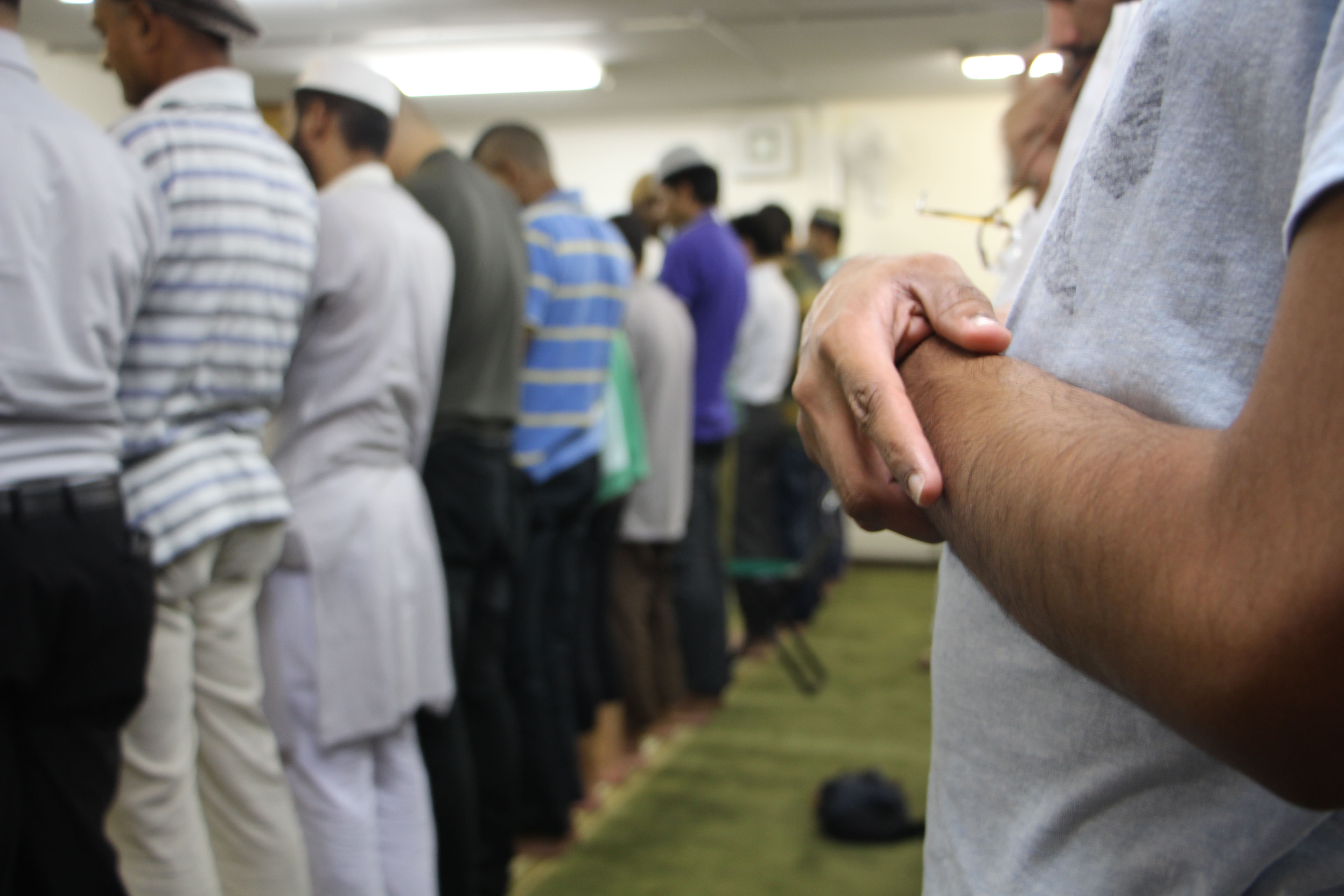 Muslims pray at Otsuka Mosque in Tokyo. There are around 100,000 Muslims in Japan, 90 percent of whom are foreign nationals. | JARNI BLAKKARLY