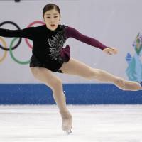 Yuna Kim had to settle for the silver medal at the 2014 Olympics in the wake of controversial judging that gave Russia\'s Adelina Sotnikova the gold. Revelations of doping by Russia during the Sochi Games could change that. | AP