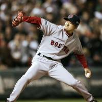 Red Sox pitcher Hideki Okajima pitches against the Rockies during the 2007 World Series. | KYODO