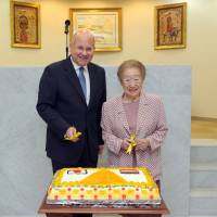 Egyptian Ambassador Ismail Khairt (left) prepares to cut a cake with Japan International Cooperation Agency (JICA) Special Advisor to the President Sadako Ogata (former president of JICA and UNHCR) at a reception to celebrate Egypt\'s National  Day at the ambassador\'s residence in Tokyo on July 1. | YOSHIAKI MIURA