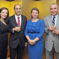 Counsellor and DCM of the Embassy of the Republic of Tunisia Mohamed Elloumi (second from left) and his wife Houda (second from right) are joined by Tunisian Ambassador Kais Darragi (right) and his wife Wided (left) during a farewell party for Elloumi at the ambassador\'s residence in Tokyo on July 11. | YOSHIAKI MIURA