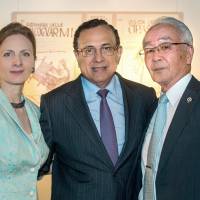 Peruvian Ambassador Elard Escala (center) and his wife Cristina pose with guest speaker Hidefuji Someda, professor emeritus of Osaka University, during the opening of an exhibition of author Guaman Poma de Ayala at Institute Cervantes Tokyo on July 7. The exhibition runs until Aug. 23. | PERUVIAN EMBASSY