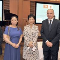 Princess Takamado (center) poses with members of the Tunisian National Dialogue Quartet, the winners of the 2015 Nobel Peace Prize, (from left) Tunisian General Labor Union Secretary-General, Hassine Abassi; Tunisian Confederation of Industry, Trade and Handicrafts President Wided Bouchamaoui; Ambassador of Tunisia in Japan Kais Darragi; and Tunisian Human Rights League President Abdessattar Ben Moussa at a reception in their honor at the Peninsula Hotel Tokyo on July 22. | YOSHIAKI MIURA