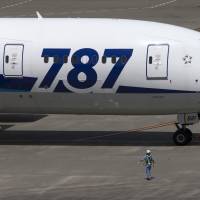 A Boeing 787 Dreamliner owned by All Nippon Airways Co. taxies at Haneda airport in Tokyo last month. | BLOOMBERG