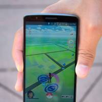 A cellphone screen shows the game “Pokemon Go” in San Gabriel, California, last month. It’s the smartphone game electrifying the world but New York took steps Monday to ban sex offenders from using the app to potentially prey on child victims. New York bars paroled, registered sex offenders from playing 'Pokemon Go'