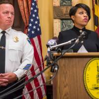 Baltimore Mayor Stephanie Rawlings-Blake speaks next to Interim Police Commissioner Kevin Davis during a news conference in Baltimore in 2015. | REUTERS