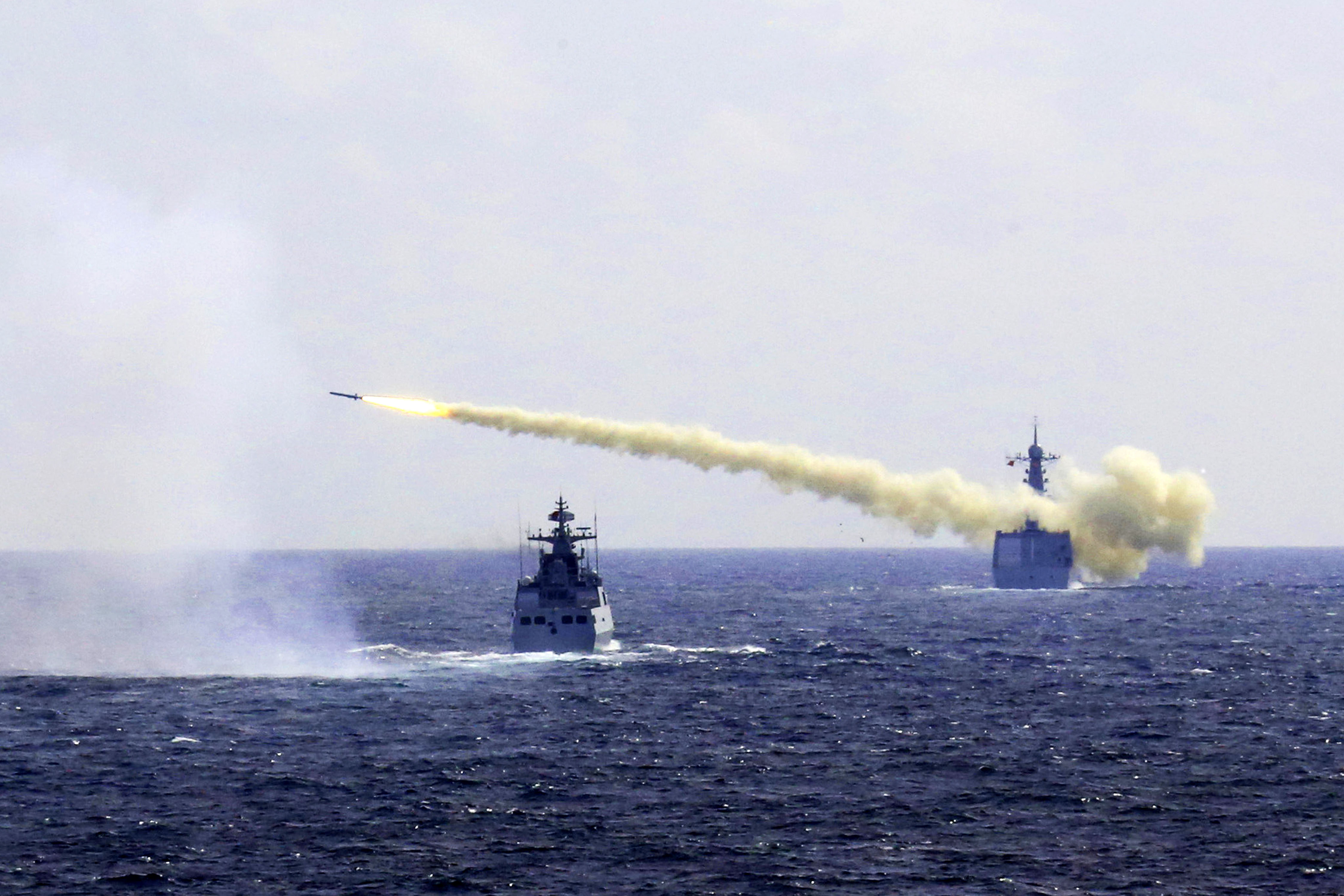 A missile is launched from a Chinese Navy ship during a live-ammunition drill in the East China Sea in this photo released Monday. | AP