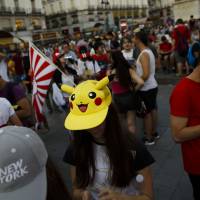 The highly addictive \"Pokemon Go\" game has stoked concern in Russia, where the government is wary that the game could help political opponents assemble for protests. | AP