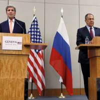 U.S. Secretary of State John Kerry and Russian Foreign Minister Sergey Lavrov attend a news conference after a meeting on the Syrian conflict in Geneva on Friday. | REUTERS