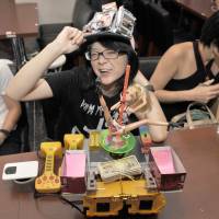 Anipole Kyoko was honored for her lousy robot at the Hebocon World Championship on Sunday in Tokyo. | YOSHIAKI MIURA