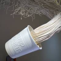 An artwork modeled after Cup Noodles products is exhibited at the Cup Noodles Museum in Yokohama. | SHUSUKE MURAI