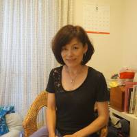 Megumi Katanuma, 49, speaks of the ordeal single mothers face, in an interview in Tokyo on Aug. 17. | MAGDALENA OSUMI