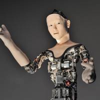 Alter, a new robot developed by researchers at Osaka University and the University of Tokyo, is unveiled at the National Museum of Emerging Science and Innovation (Miraikan) in Tokyo\'s Koto Ward on July 29. | YOSHIAKI MIURA