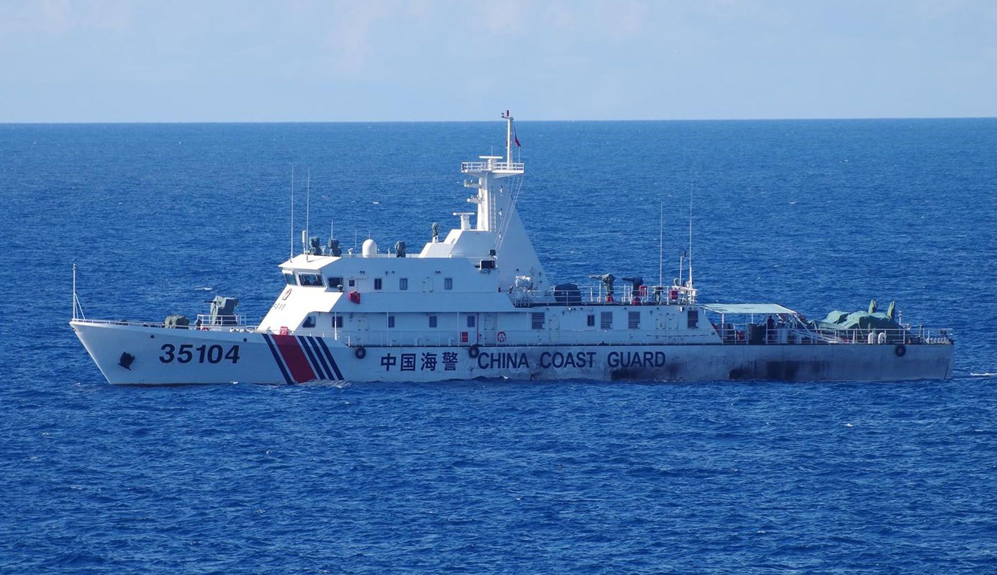 A China Coast Guard vessel is seen in waters near the Japanese-controlled Senkaku Islands on Saturday morning. | JAPAN COAST GUARD / VIA KYODO