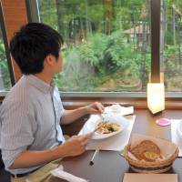 Seibu Railway Co.\'s restaurant train bound for Chichibu, Saitama Prefecture, allows passengers to take in the scenery as they have lunch. | YOSHIAKI MIURA