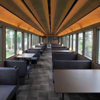 Seibu Railway Co.\'s restaurant train, designed by architect Kengo Kuma, is shown on July 27. | YOSHIAKI MIURA