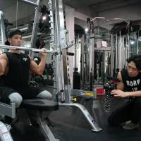 Subscribing to a healthy lifestyle: Shun Kaneko works out for his Kanekin Fitness channel on YouTube. He says via the website he has received a lot of questions from people about where to start when it comes to exercise. | ALISA YAMASAKI