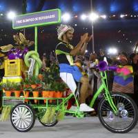 The refugee athletes\' team arrives for the Opening Ceremony of the Rio de Janeiro Summer Olympics on Friday night. | REUTERS