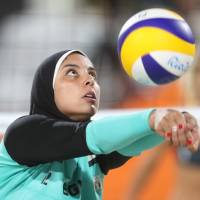 Egypt\'s Doaa Elghobashy passes a ball during a women\'s beach volleyball match against Germany at the 2016 Rio de Janeiro Olympics on  Sunday. | AP