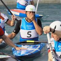 Japan\'s Takuya Haneda reacts after he earned the bronze medal in the men\'s canoe slalom at the Rio de Janeiro Olympics on Tuesday. He became the first-ever Japanese Olympic medalist in the sport. | KYODO