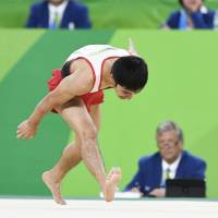 Kenzo Shirai stumbles during his floor routine of the artistic gymnastics men\'s apparatus final  at the 2016 Summer Olympics in Rio de Janeiro on Sunday. | KYODO