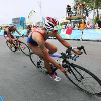 Yuka Sato competes in the women\'s triathlon on Saturday at the 2016 Rio Olympics. | KYODO