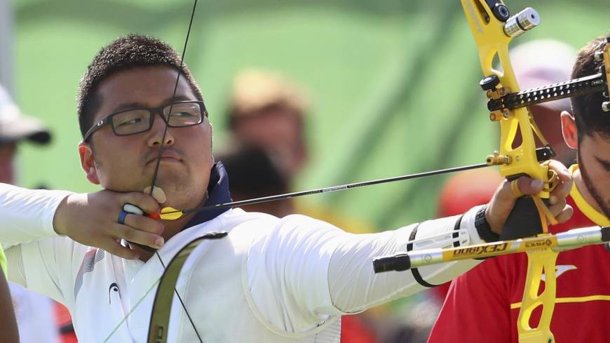 South Korean archer Kim Woo-jin competes in the men’s individual ranking round at the Rio Olympics on Friday. South Korean archer sets first world record of Rio Games