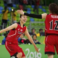 Mika Kurihara (left) and Asami Yoshida celebrate after Japan\'s win over Belarus in the Olympic women\'s basketball tournament on Saturday in Rio de Janeiro. | REUTERS