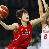 Maki Takada goes up for a shot during Japan\'s game against Belarus on Saturday. | KYODO