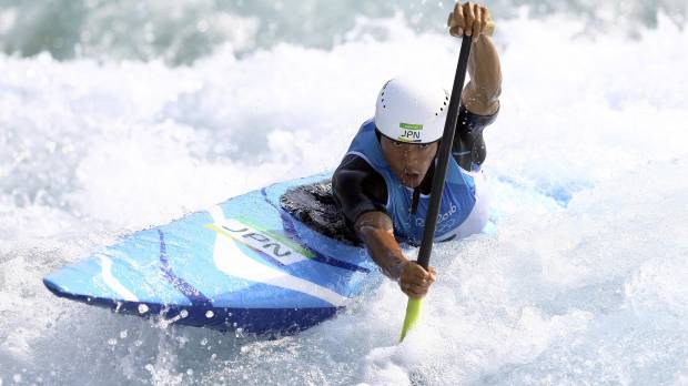Takuya Haneda competes in the C1 men’s final of the canoe slalom at the 2016 Summer Olympics on Tuesday. Haneda takes bronze for Japan's first-ever Olympic medal in canoe slalom