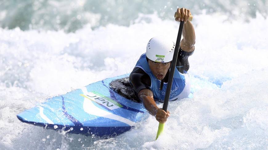 Takuya Haneda competes in the C1 men’s final of the canoe slalom at the 2016 Summer Olympics on Tuesday. Haneda takes bronze for Japan's first-ever Olympic medal in canoe slalom