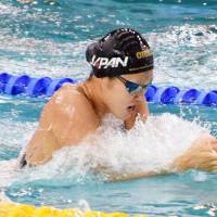 Rie Kaneto swims in the women\'s 100-meter breaststroke final at a short-course World Cup meet in Chartres, France, on Friday. Kaneto earned a fourth-place finish. | KYODO